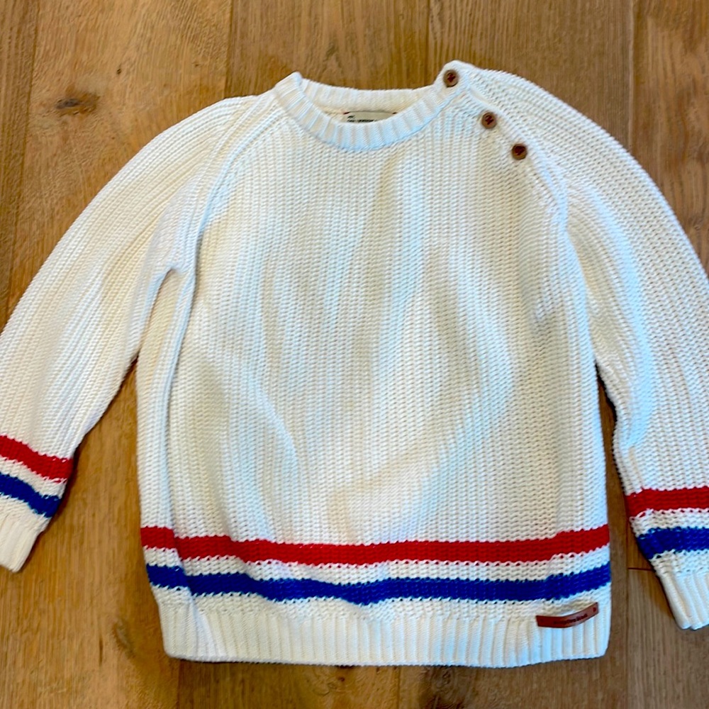 New beautiful girls chunky sweater. Ivory, red and blue with wooden buttons.